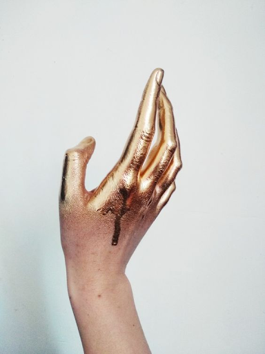 gold dripped hand